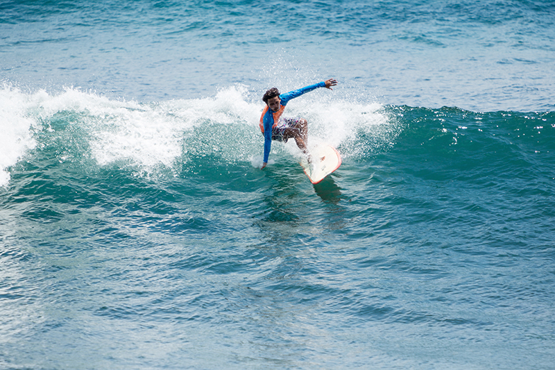 A surfer at Balagan Beach, Bali. Photo © Nadezda Murmakova | Shutterstock