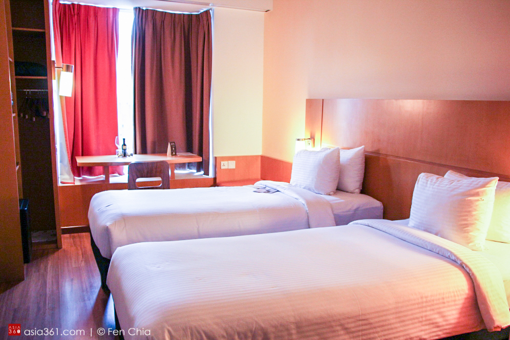 Room in the signature orange-red hues of ibis.