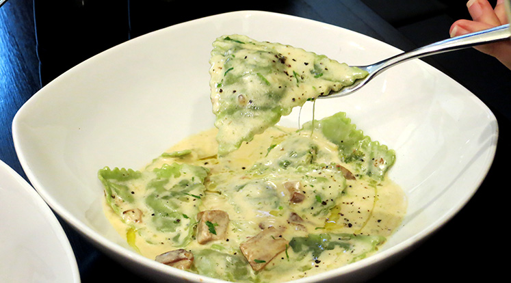 Green Spinach ‘TRIANGOLI’ stuffed with spinach and mushrooms in porcini & cream sauce - $18