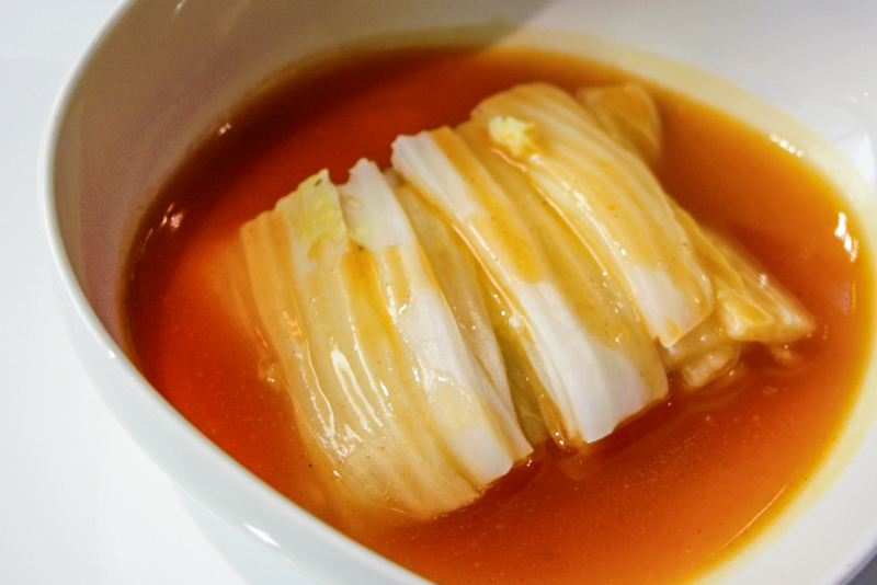 Poached cabbage in lobster bisque. Photo © Fen Chia. 