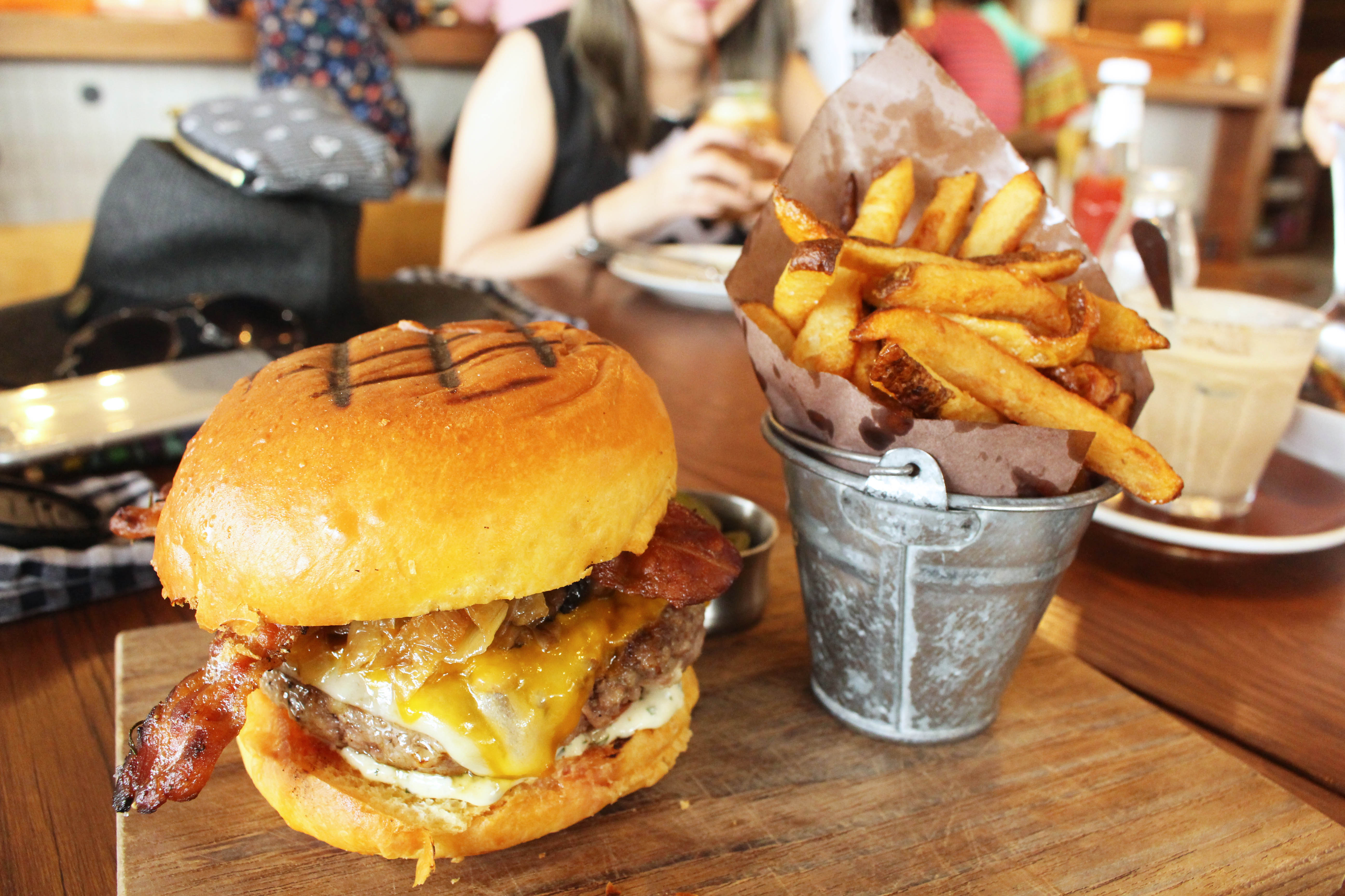A mouthwatering Johnnys Burger served alongside thick-cut fries at Roast, which came up to around 18SGD