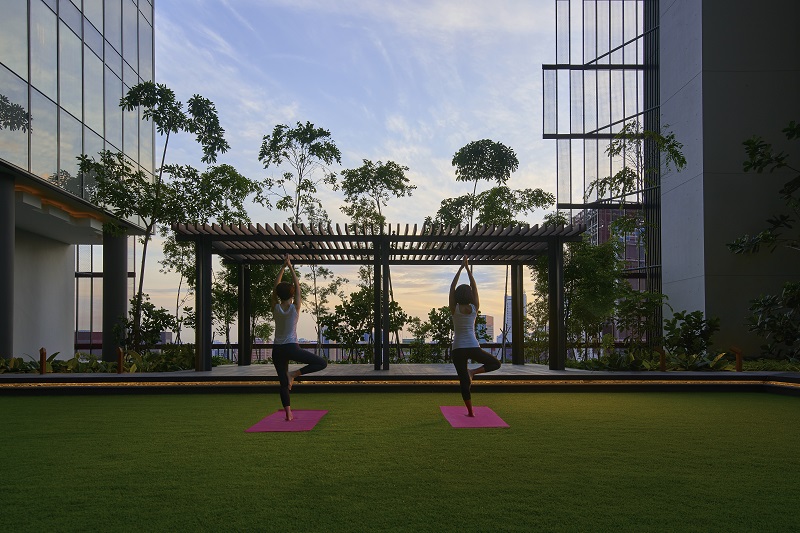 Guests can practice yoga in style on the big open lawn on the hotel's 12th floor.