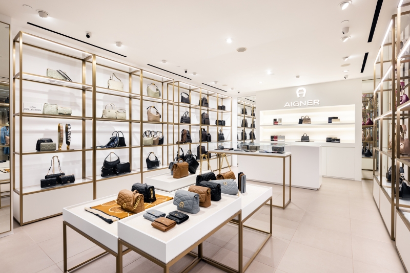 Aigner Reopens a Gilded Toned Flagship Store at Paragon in